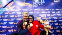 IMG 20211013 100553 Pasangan Suami Istri Kompak Sabet Emas Pencak Silat di PON XX Papua